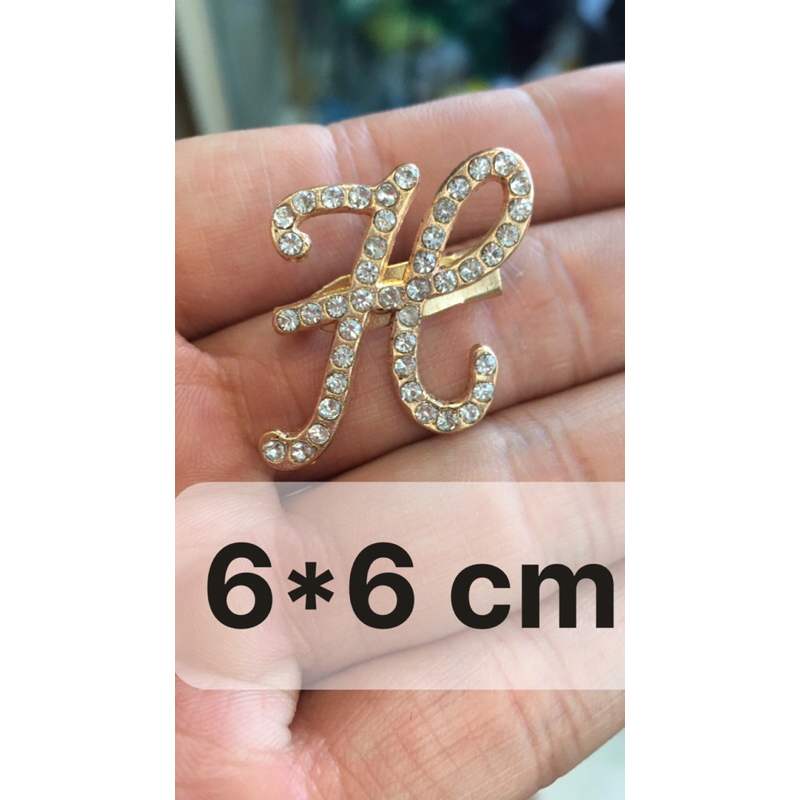 Ghim cài chữ H
