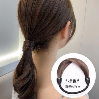 Cột tóc bằng tóc giả