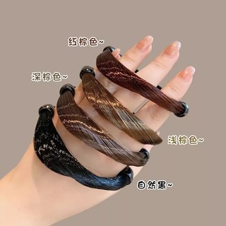 Cột tóc bằng tóc giả
