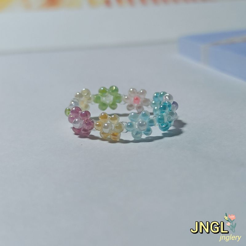 Nhẫn hạt cườm gạo kết hoa nhí