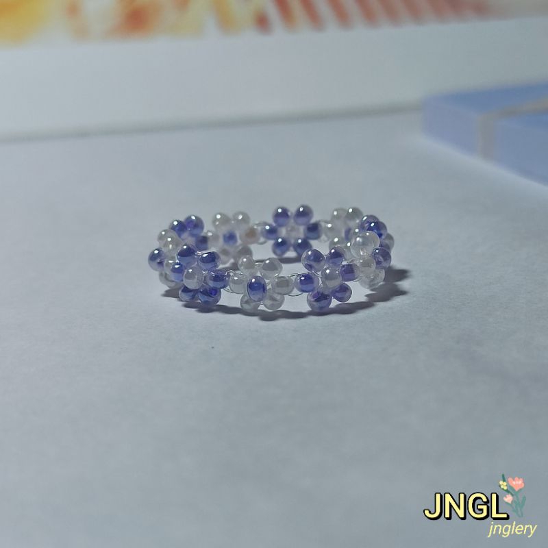 Nhẫn hạt cườm gạo kết hoa nhí