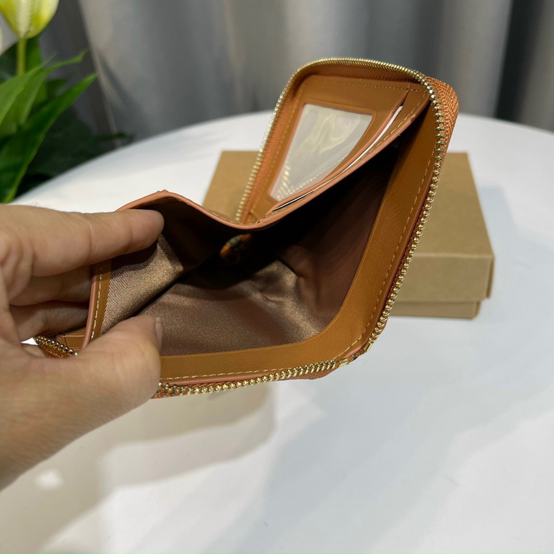 Ví Coach ngắn X Peanuts Small Zip