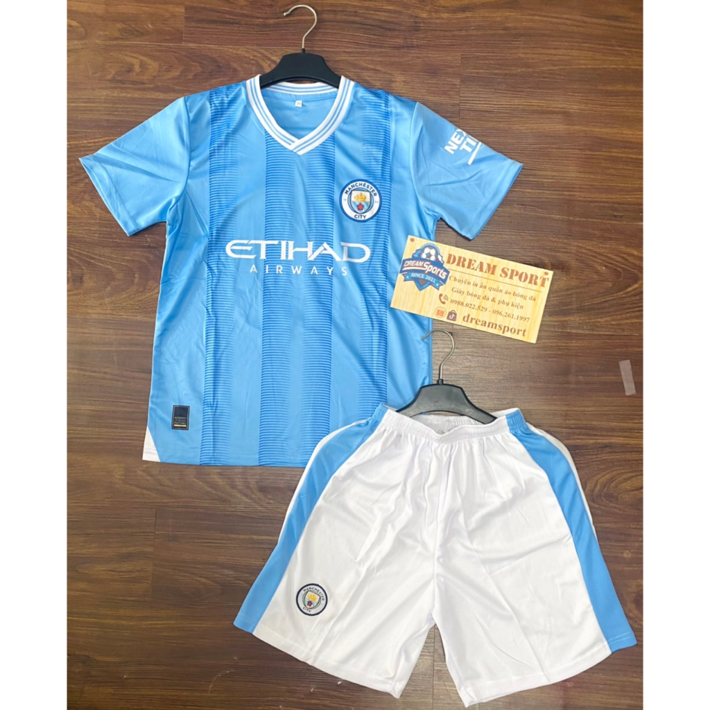 Bộ quần áo bóng đá trẻ em Man City sân nhà màu xanh mùa giải 2023-2024