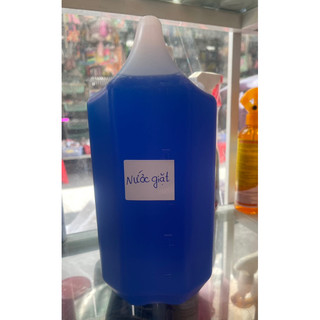 Nước giặt quần áo can 5 lít .