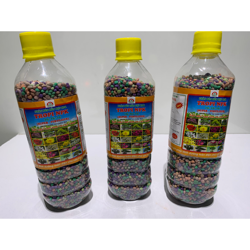Phân tan chậm NPK 15-15-15 chai 4 màu chuyên dùng cho kiểng lá - cây ăn quả rau màu hoa cây cảnh