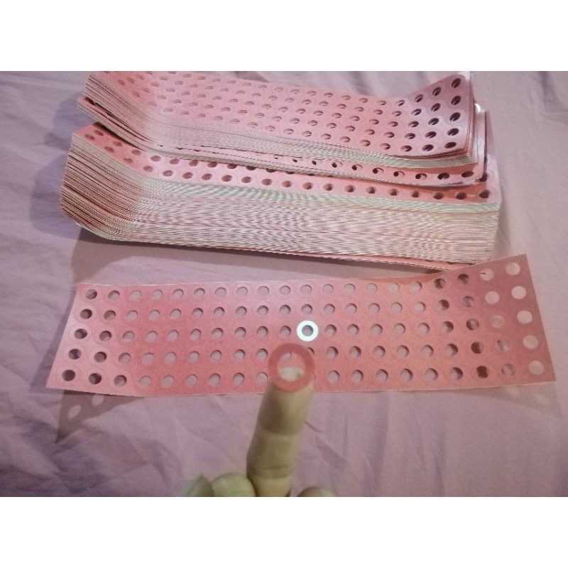 giấy dán cực dương pin 18650 (1 tờ 100 miếng)