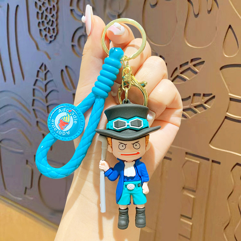 Móc khóa one piece tag dệt, móc cài balo silicon cao cấp