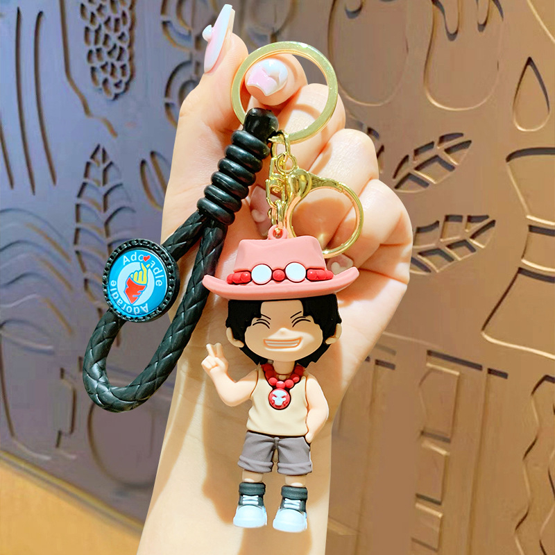 Móc khóa one piece tag dệt, móc cài balo silicon cao cấp