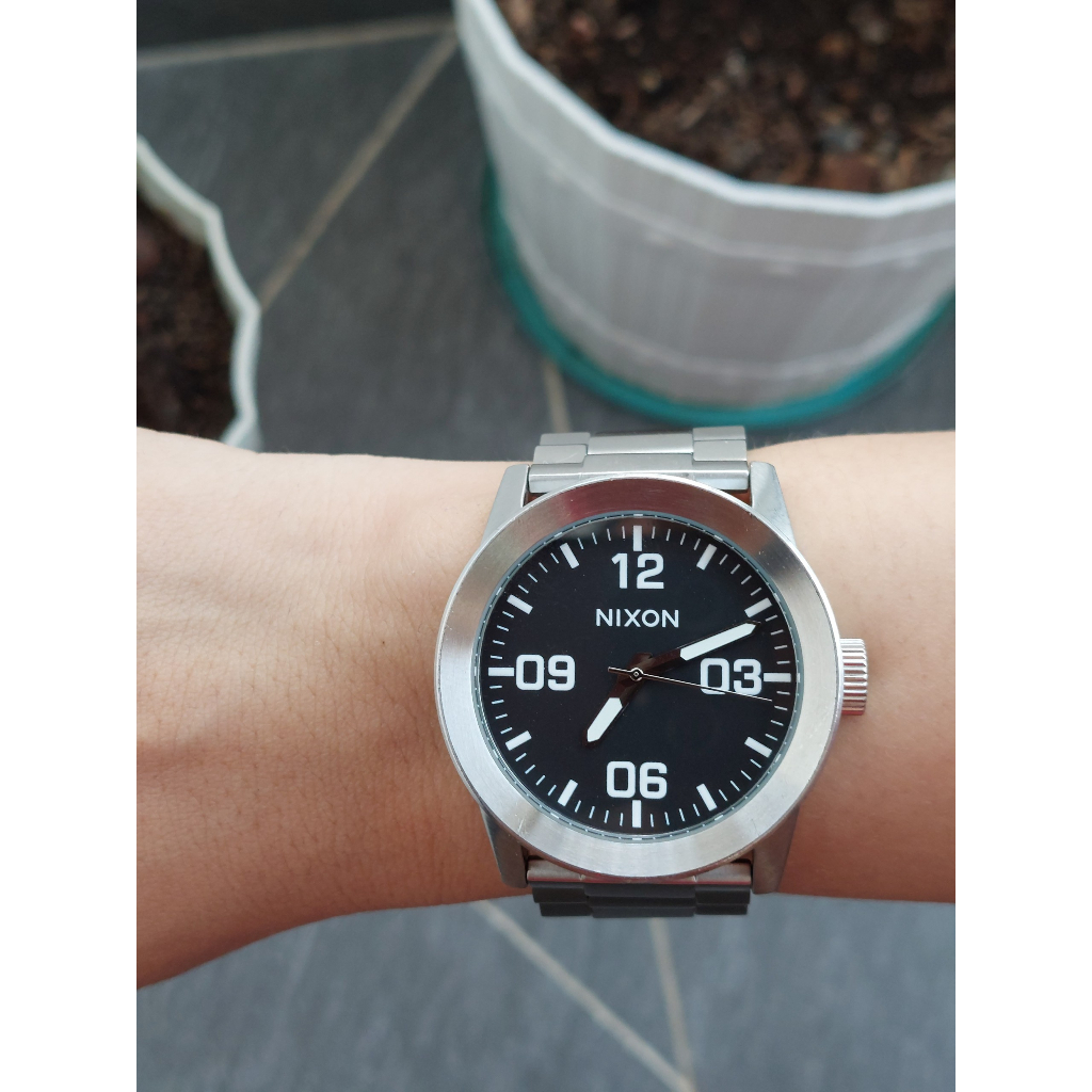 Đồng hồ nam Nixon đen full hộp chạy pin hàng Si