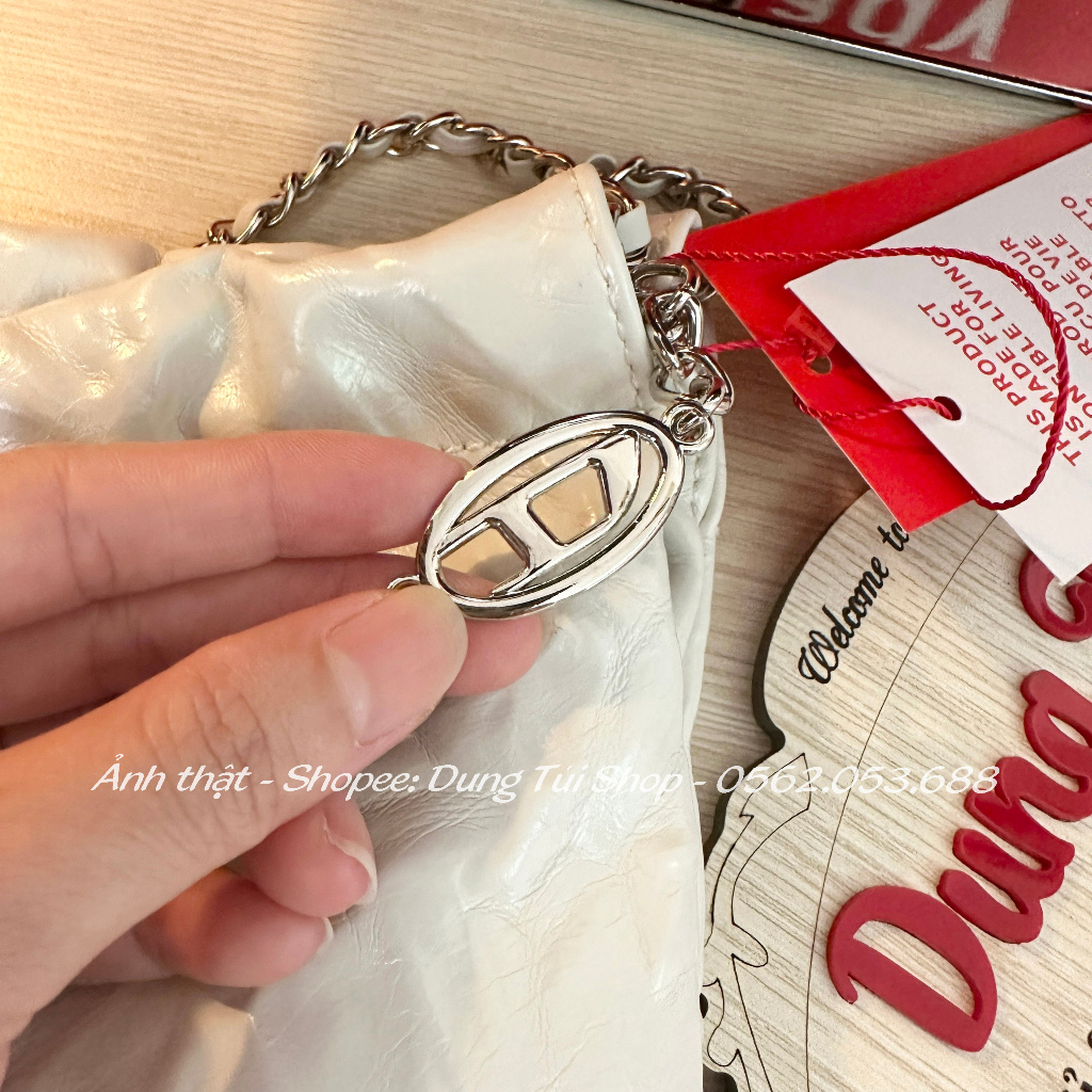 Túi Disel nữ đeo vai size 34 chất da nhăn ngăn rộng có cài miệng túi full màu