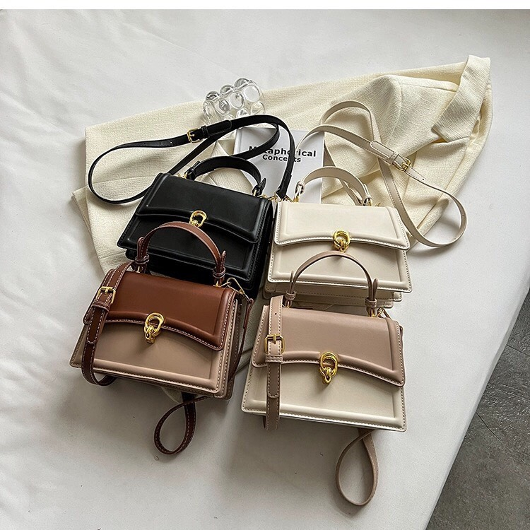 Túi xách da nữ, dây dài đeo chéo, khóa tròn nổi bật SL102