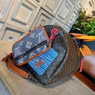 Túi du lịch Louis Vuitton Da bò cao cấp