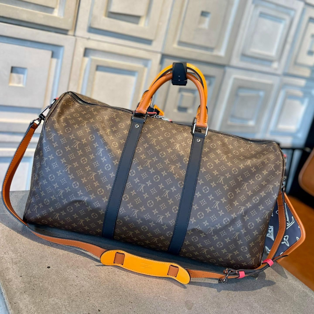 Túi du lịch Louis Vuitton Da bò cao cấp