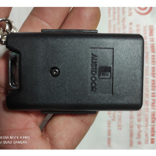 Tay điều khiển cửa cuốn Austdoor mã nhảy 315 mhz