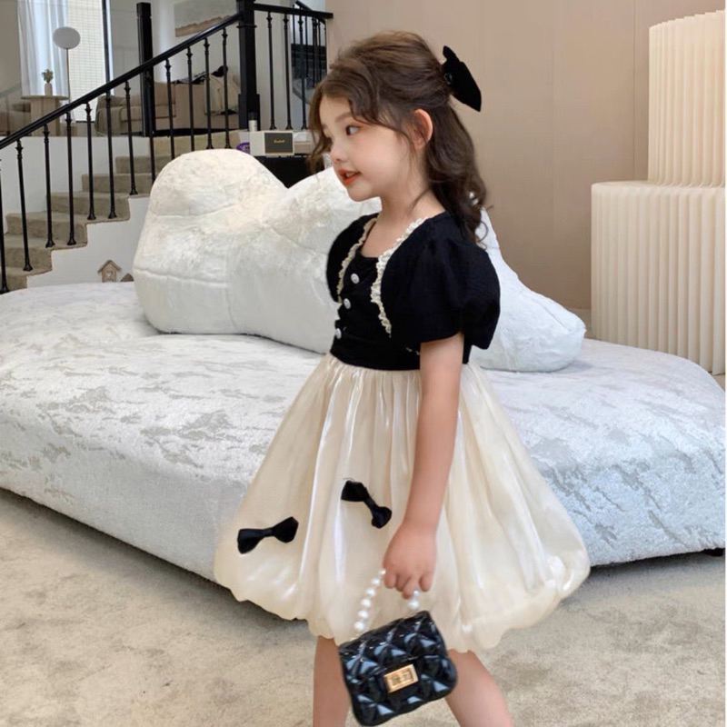 Váy đầm nơ đen tơ óng cho bé gái 10-28kg