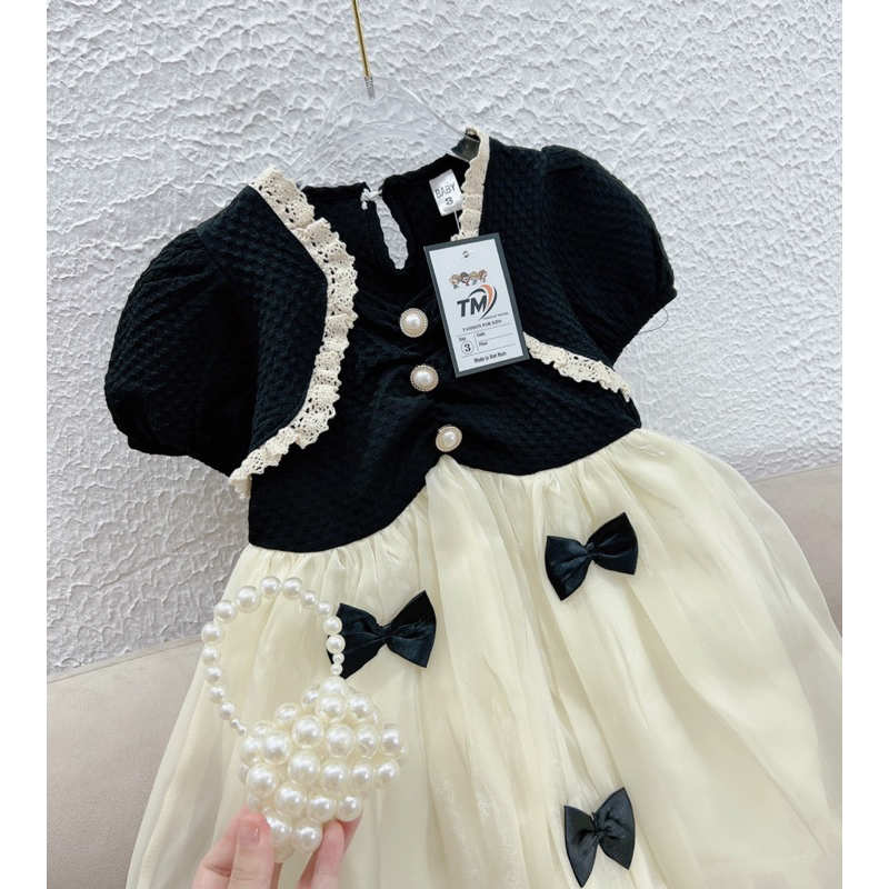 Váy đầm nơ đen tơ óng cho bé gái 10-28kg