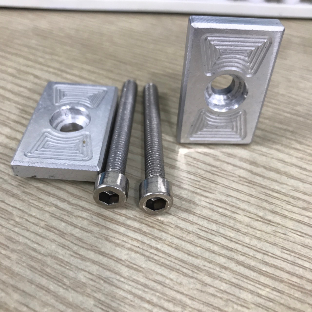 Nắp Pát Tăng Sên Âm Exciter / Winner / Sonic / Satria / Raider Nhôm CNC Kèm 2 Ốc Lục Giác 8ly40