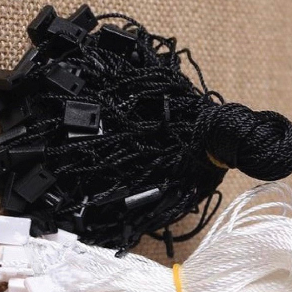 Mác tem treo gắn quần áo  các shop thời trang dây dù xâu mác 500 c mác tag-và 1000c dây dù gắn quần áo .