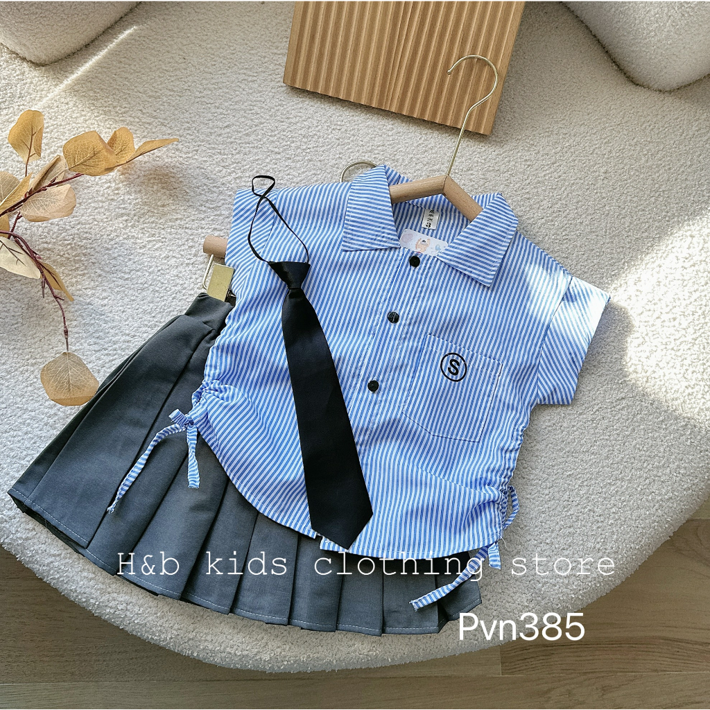 Set váy học sinh kẻ xanh kèm cà vạt bé gái