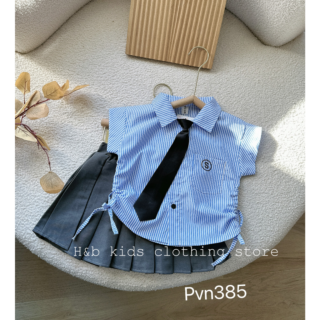 Set váy học sinh kẻ xanh kèm cà vạt bé gái