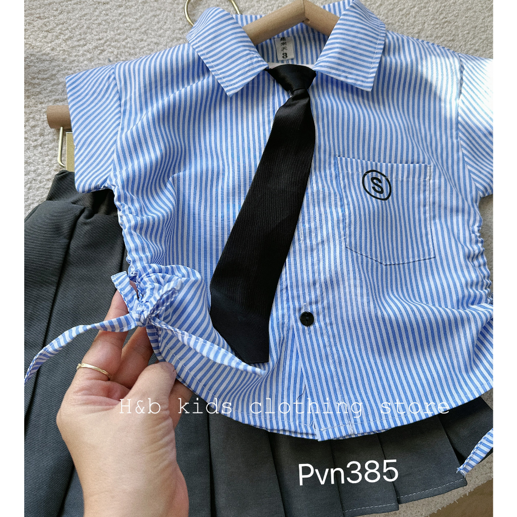 Set váy học sinh kẻ xanh kèm cà vạt bé gái