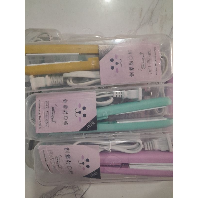 Máy hàn miệng túi mini cầm tay, kẹp hàn miệng túi