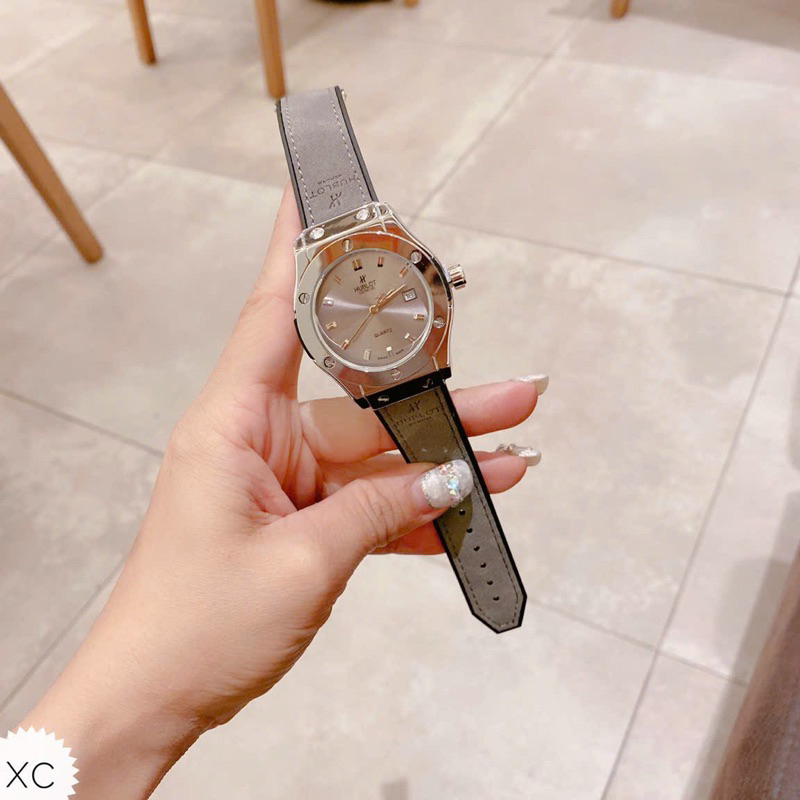 Đồng hồ Hu nam bản trơn quai da đẳng cấp