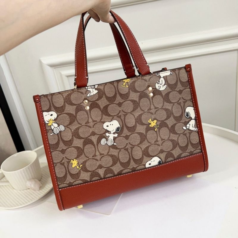 Túi Coach X Peanuts Dempsey Carryall