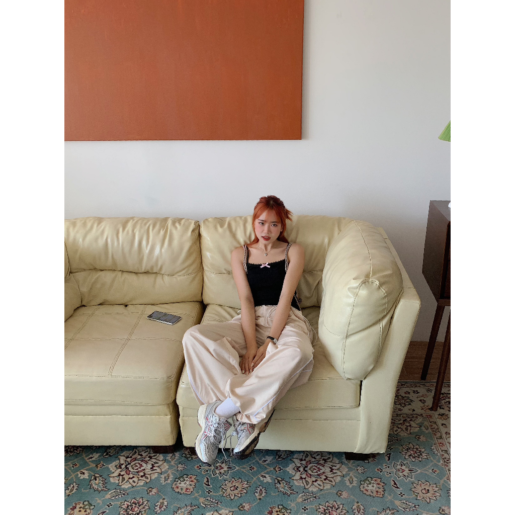 Quần dù dài ống rộng Kill System Sunny màu kem thắt nơ 2 bên lai có dây rút