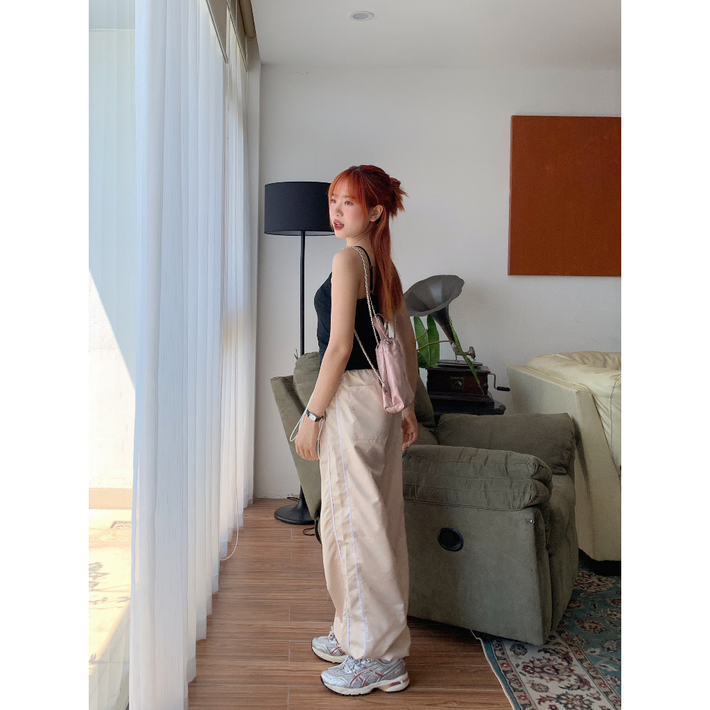 Quần dù dài ống rộng Kill System Sunny màu kem thắt nơ 2 bên lai có dây rút