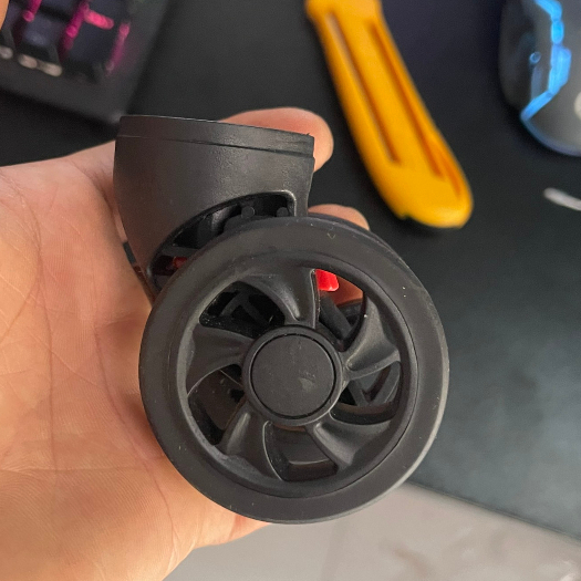 Bánh xe thay thế có chốt tháo màu đỏ dành cho Vali khung nhôm khóa sập