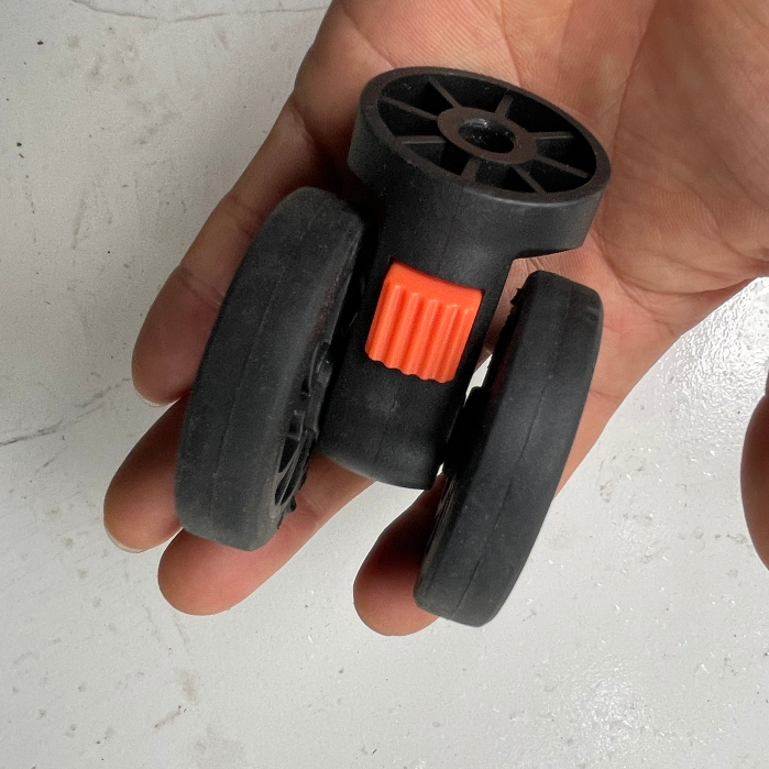 Bánh xe thay thế có chốt tháo màu đỏ dành cho Vali khung nhôm khóa sập