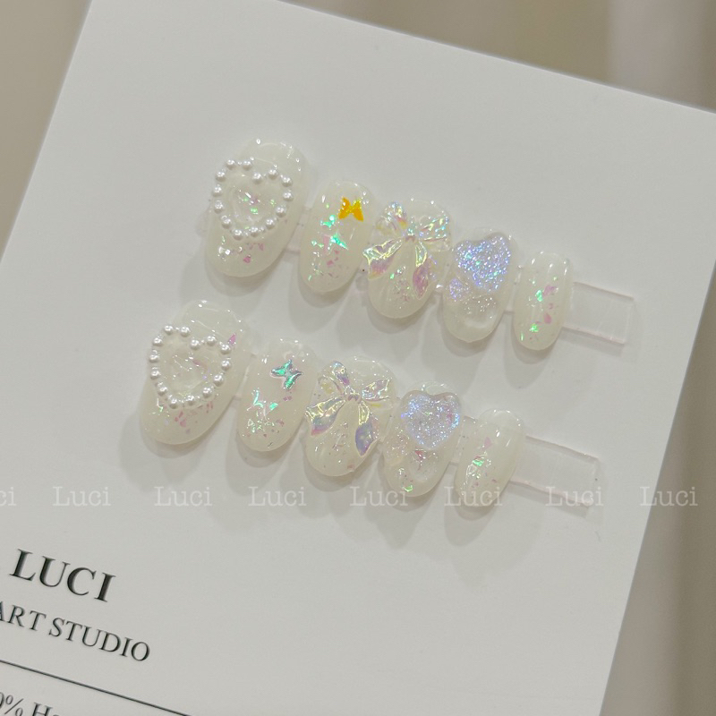Móng giả thiết kế màu thạch L007 đính nơ nhiều màu hologram luci.nailbox