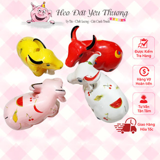 Trâu đất Tiết Kiệm gốm sứ dáng mới
