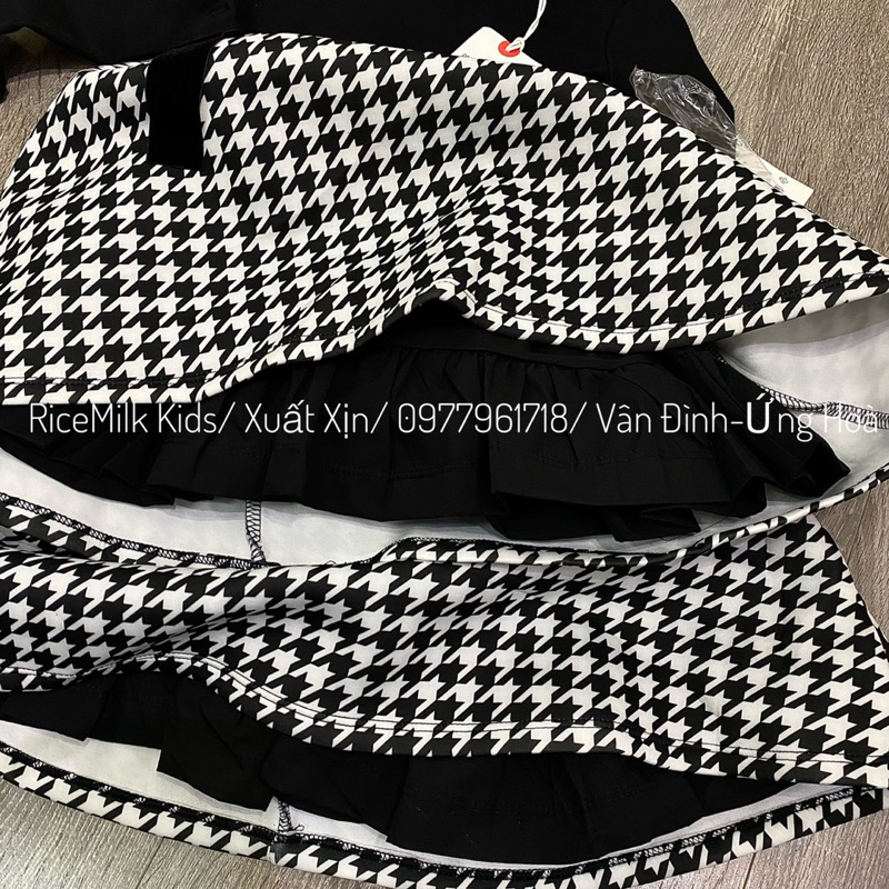 Váy đầm kẻ đen đai nhung xuất Âu dư xịn