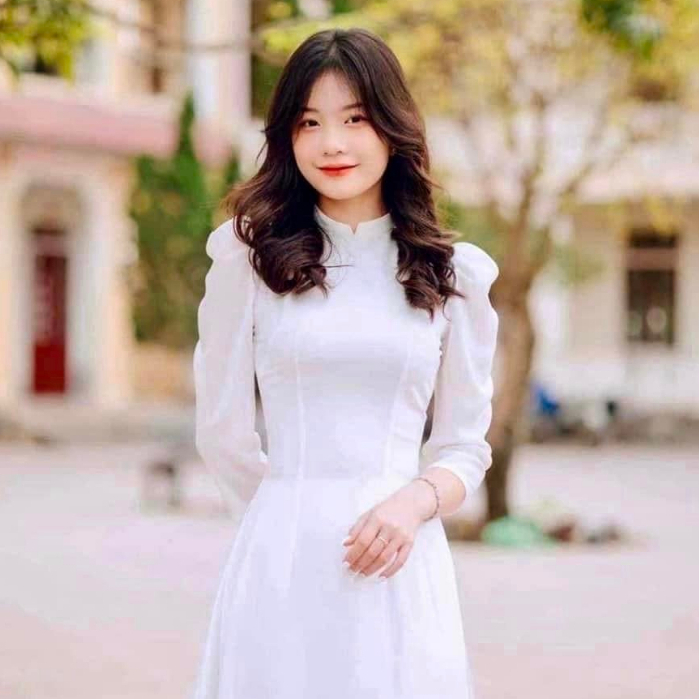 Áo dài trắng cách tân tay vai bồng lụa xước 4 tà cổ vuông đính ngọc đẹp