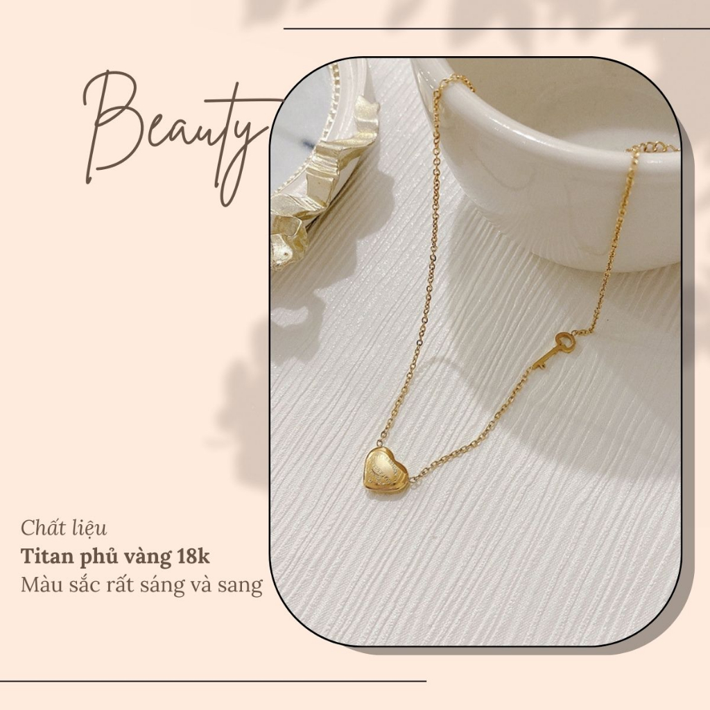 Dây chuyền titan basic mặt trái tim phối khoá, mạ vàng 18k  Her Accessories CT1
