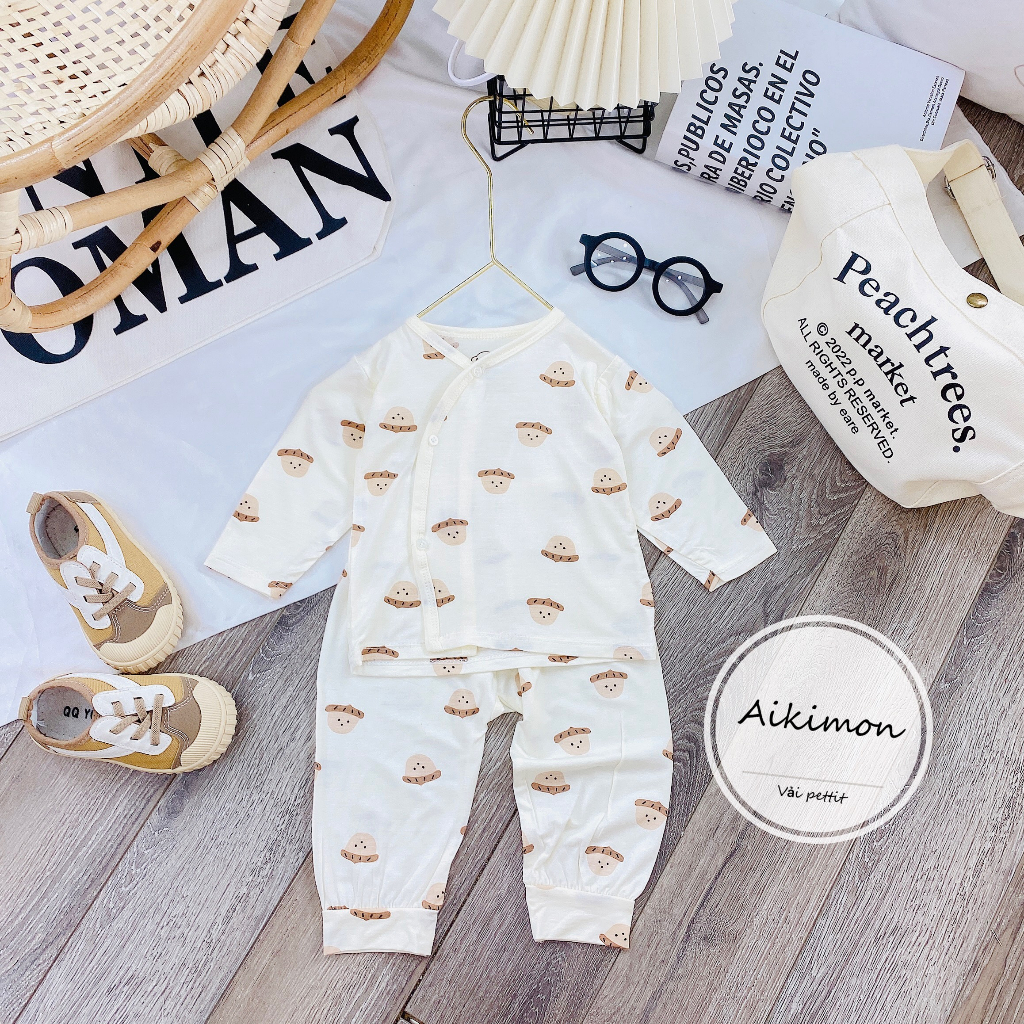 Bộ sơ sinh dài tay Petit thun lạnh AKM mềm mại cúc lệch họa tiết đáng yêu cho bé từ 3-9kg