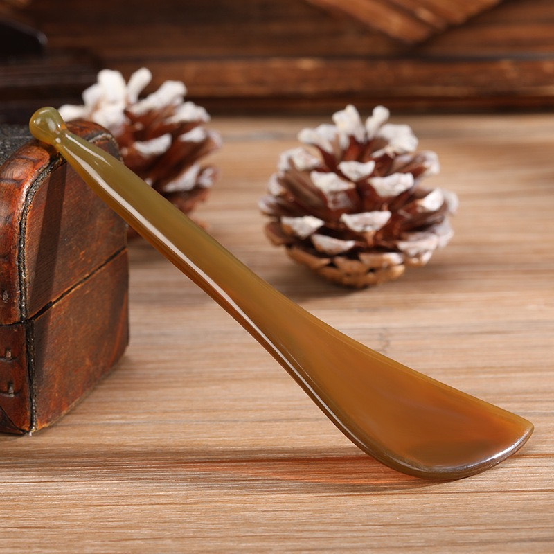 Cây Massage mặt nâng cơ mặt bằng sừng xóa tan quần thâm mắt dụng cụ mát xa mặt