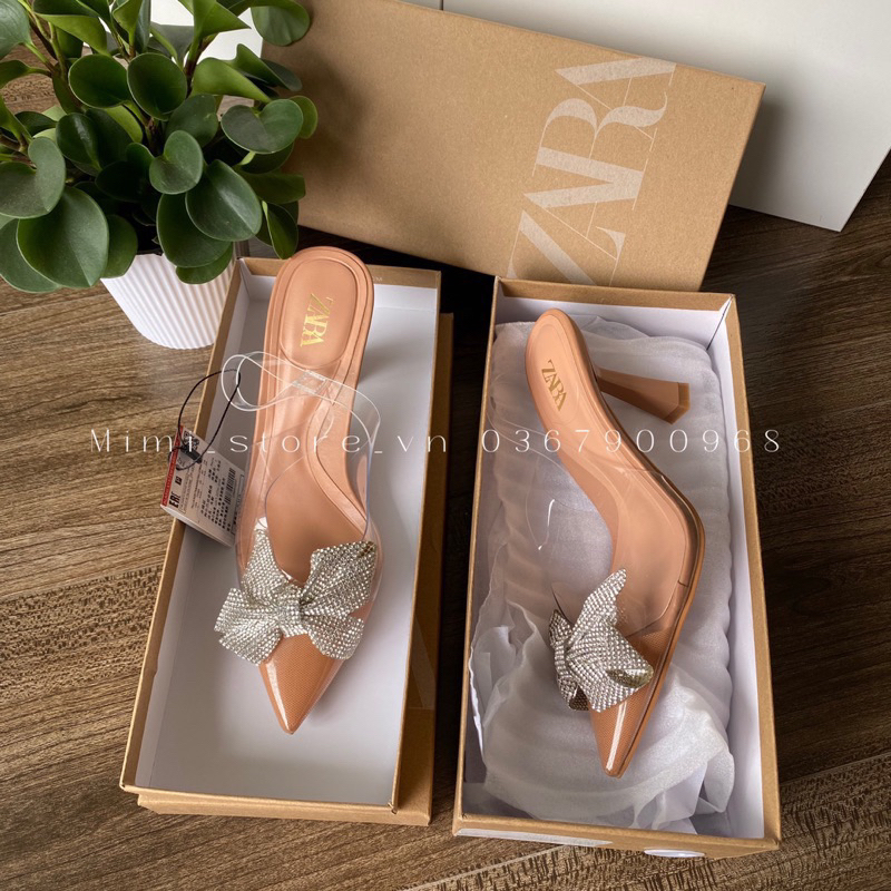 Giày cao gót nữ mũi nhọn đính nơ hạt , đế nâu , quai mica trong ZR full box MS-013