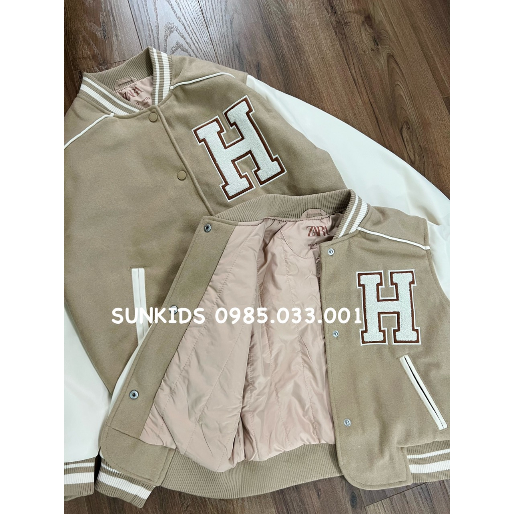 Áo khoác bomber bé trai bé gái tay phối thêu chữ H