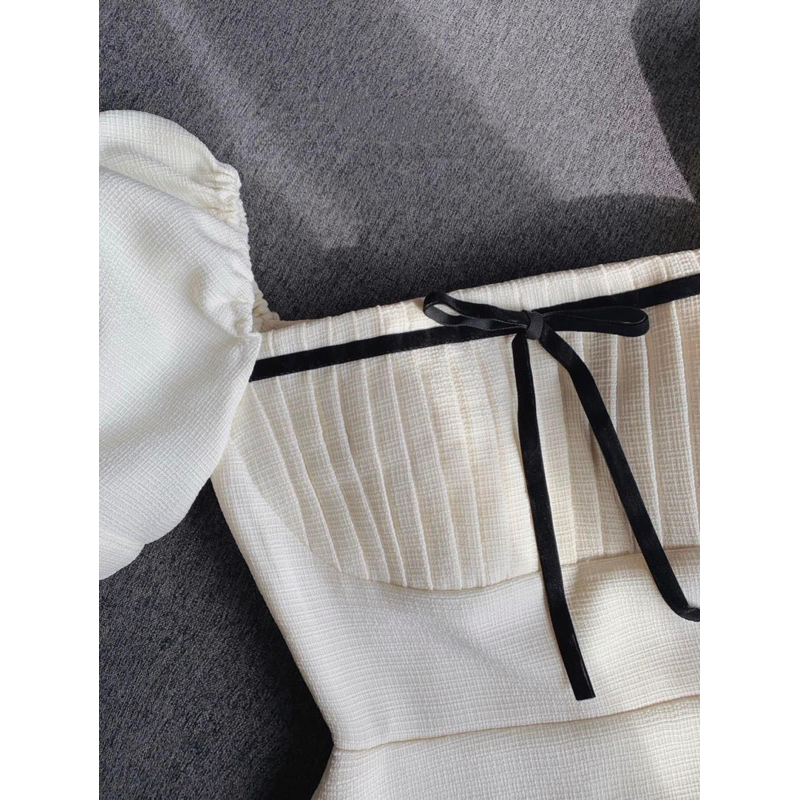 Váy thiết kế tay bồng chữ A phối nơ sọc ngực