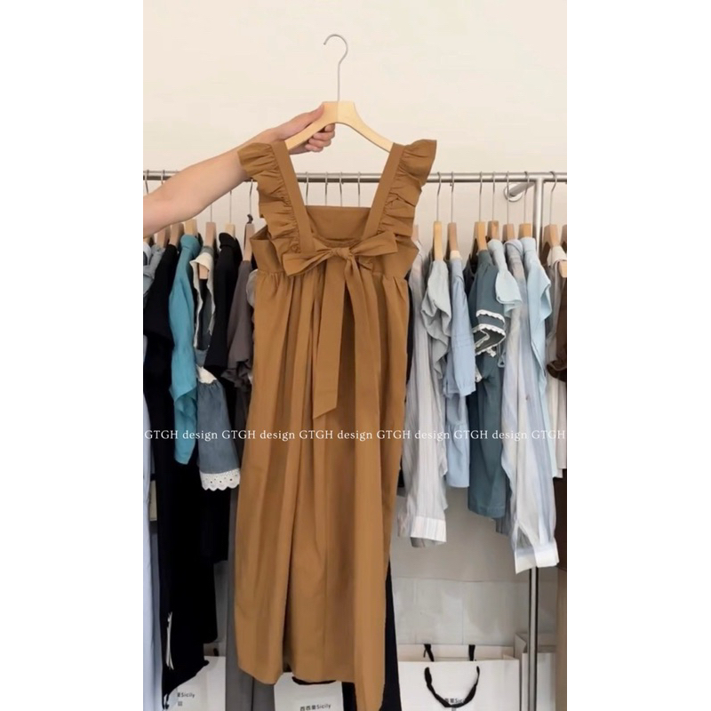 Váy nâu tây tay bèo nơ lưng siêu trắng da tiểu thư