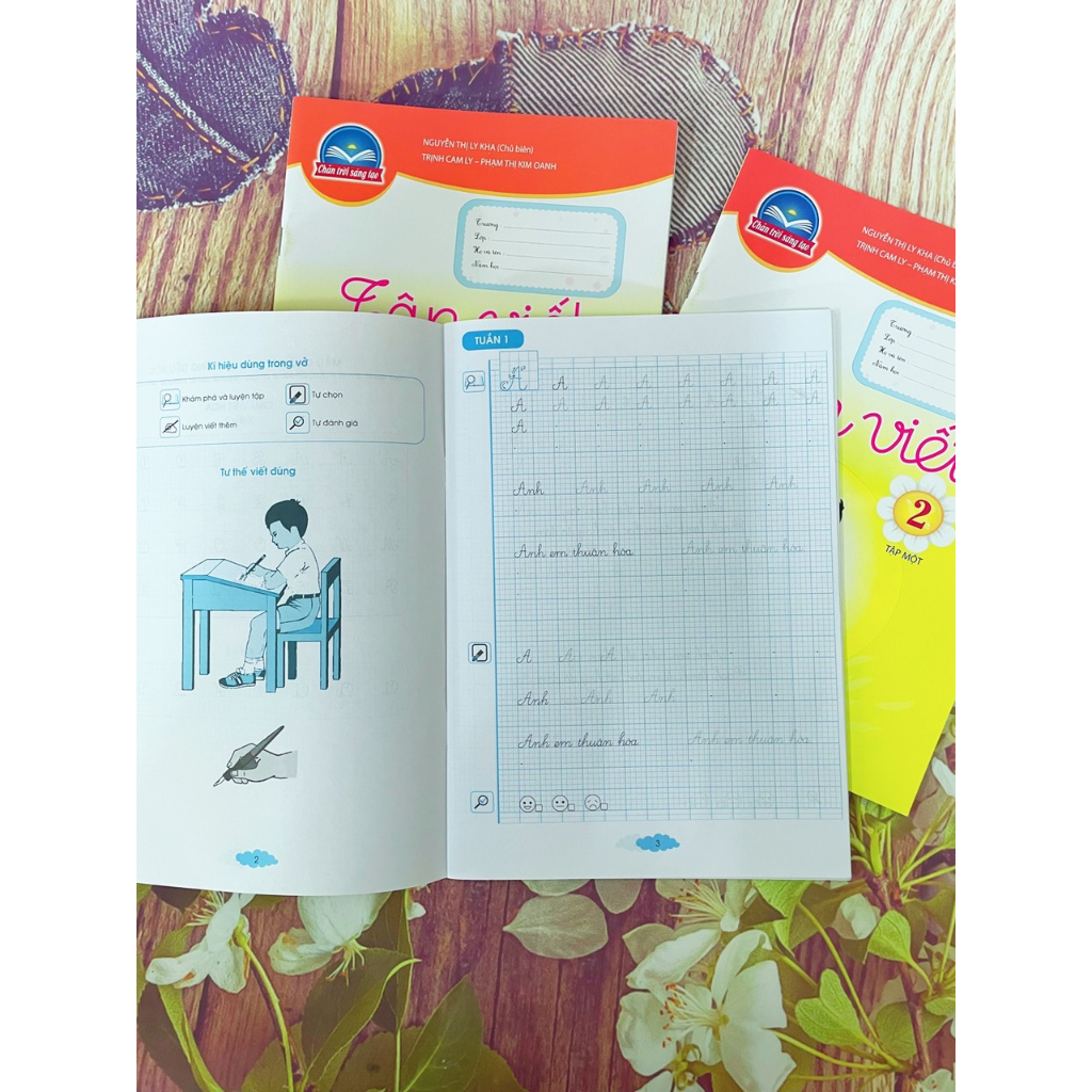 Tập Viết lớp 2 tập 1 và bao kiếng, tem nhãn