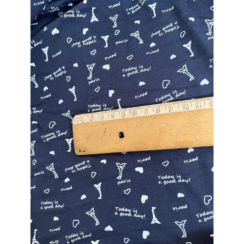 Vải thun cotton 4c Hàn hoạ tiết chữ nền xanh đen