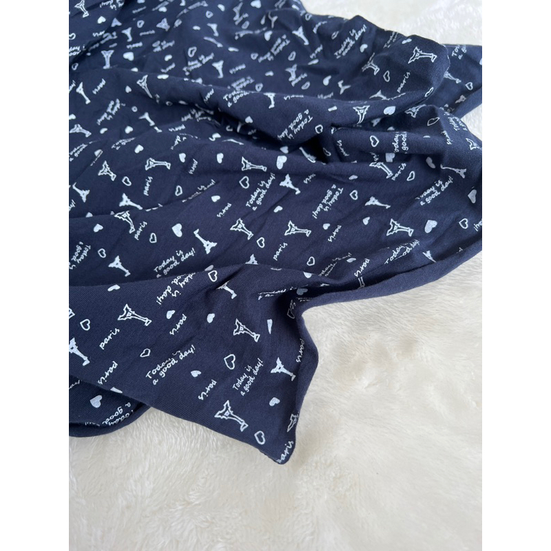 Vải thun cotton 4c Hàn hoạ tiết chữ nền xanh đen