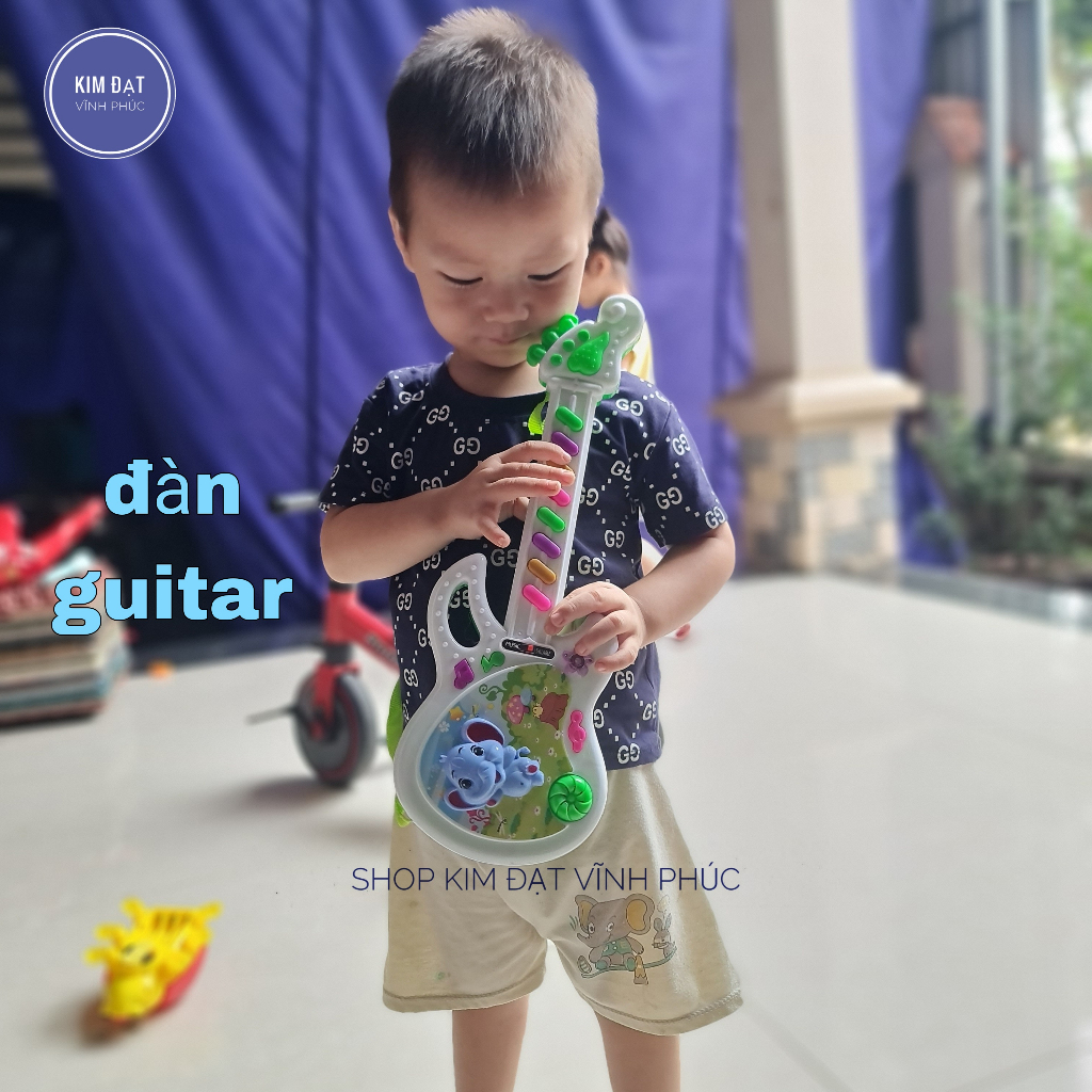 Đồ chơi đàn ghi ta cho bé . đàn phát nhạc và sáng