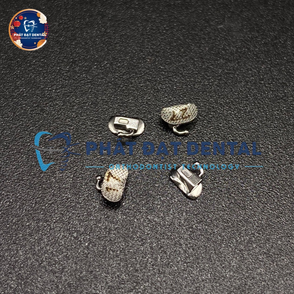 Mắc Cài Kim Loại Răng Số 7 Chỉnh Nha