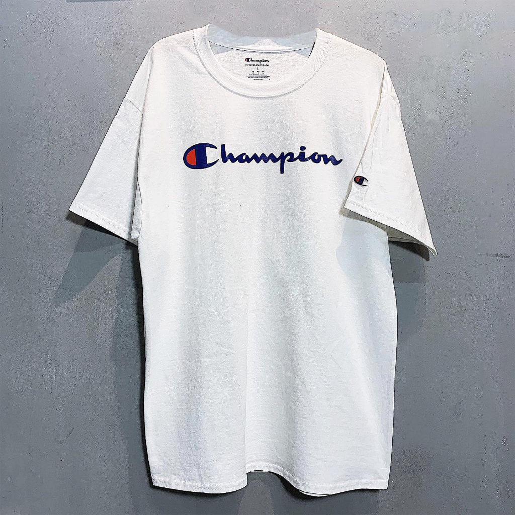 Áo Champ mới màu Trắng 100% authentic , lỗi nhẹ , bẩn nhẹ giặt ra