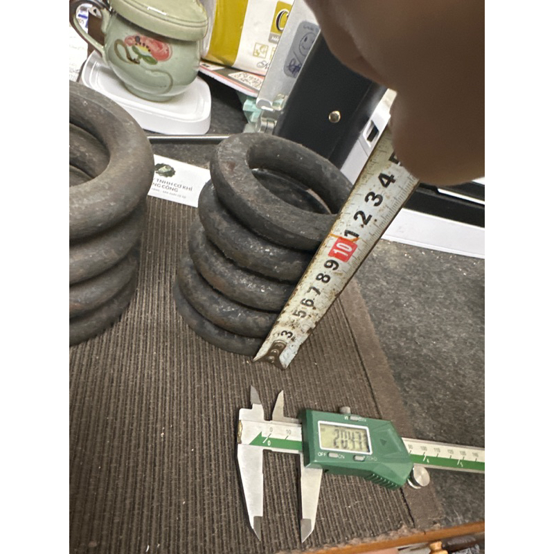 Lò xo nén đường kính ngoài 98mm cao 100 sợi 20mm